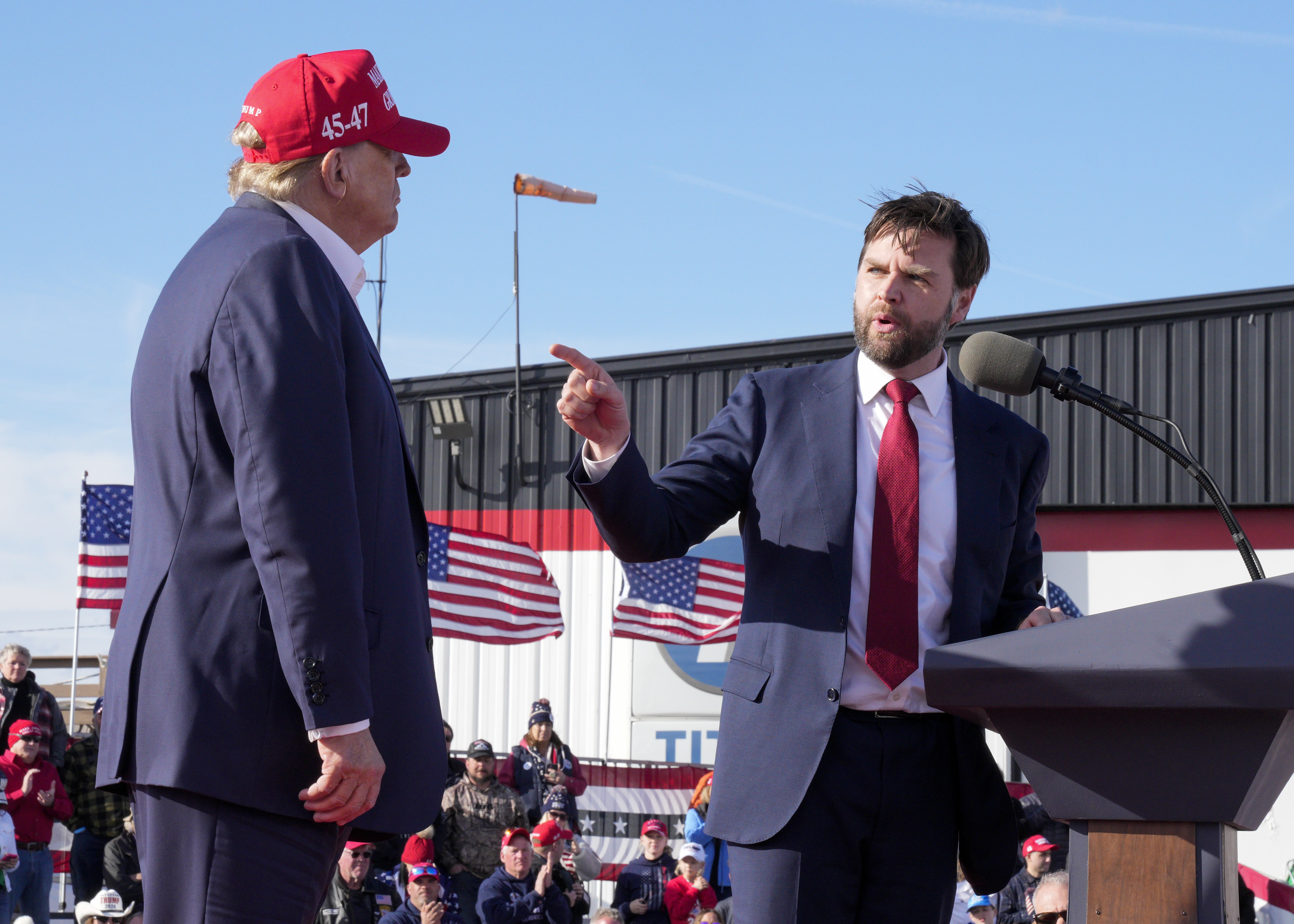 Sen. J.D. Vance (R-Ohio), right, points toward Republican presidential candidate former President Donald Trump at a March 16 campaign rally in Vandalia, Ohio. Sen. J.D. Vance (R-Ohio), right, points toward Republican presidential candidate former President Donald Trump at a March 16 campaign rally in Vandalia, Ohio.